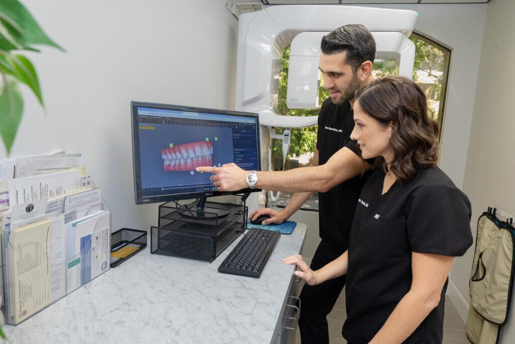 Reviewing a digital dental model on screen at DNA Dental Studio